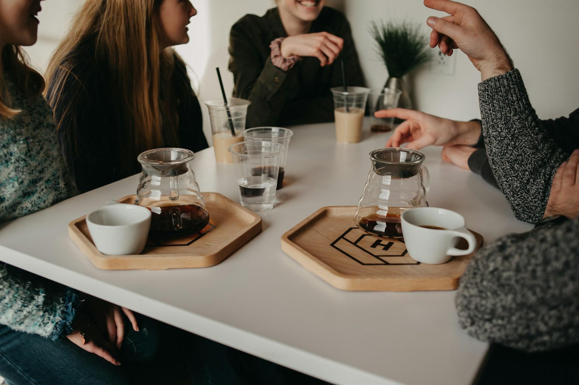 A Macbook Pro on brown wooden table by Clay Banks via UnSplash.com